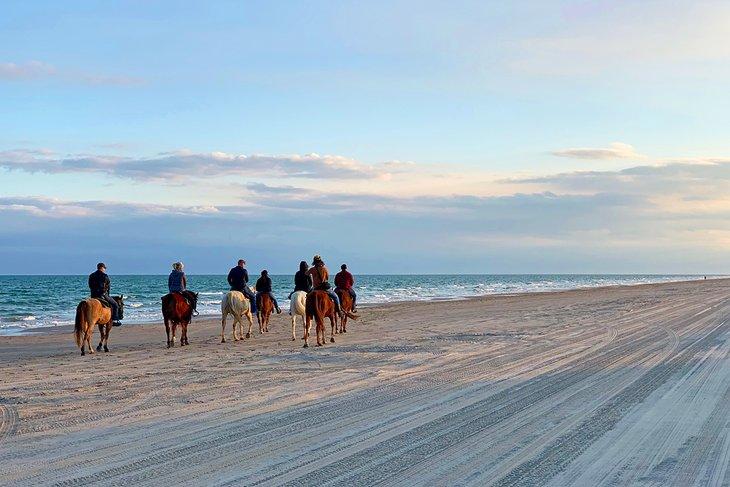 Équitation sur la plage de Whitecap