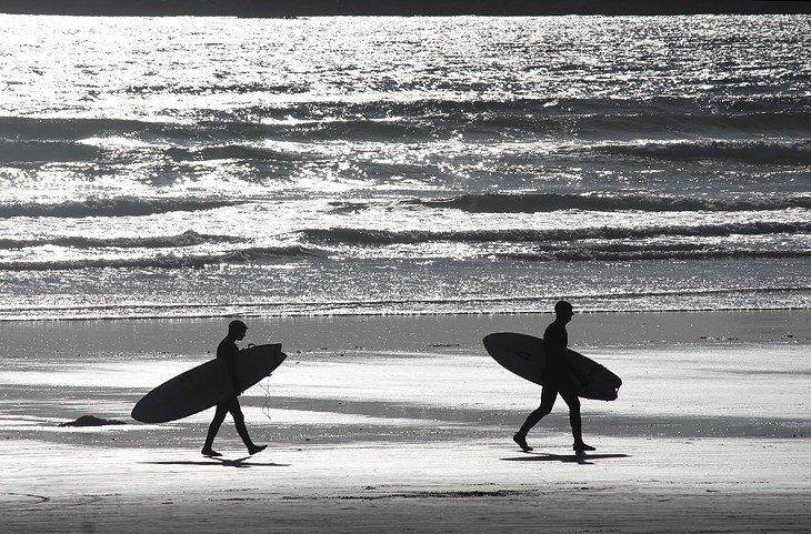 Surfer auf Cox Bay