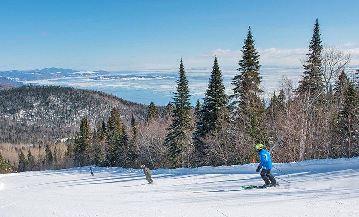 Skiing on a clear day at Le Massif