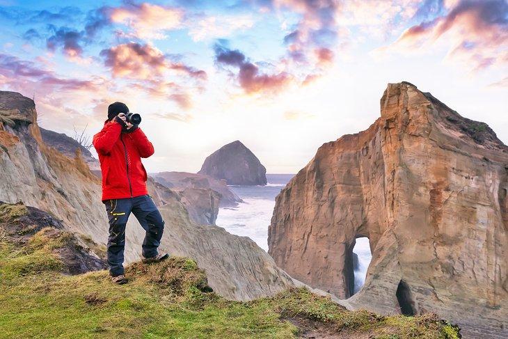 Fotógrafo capturando la belleza de Cape Kiwanda